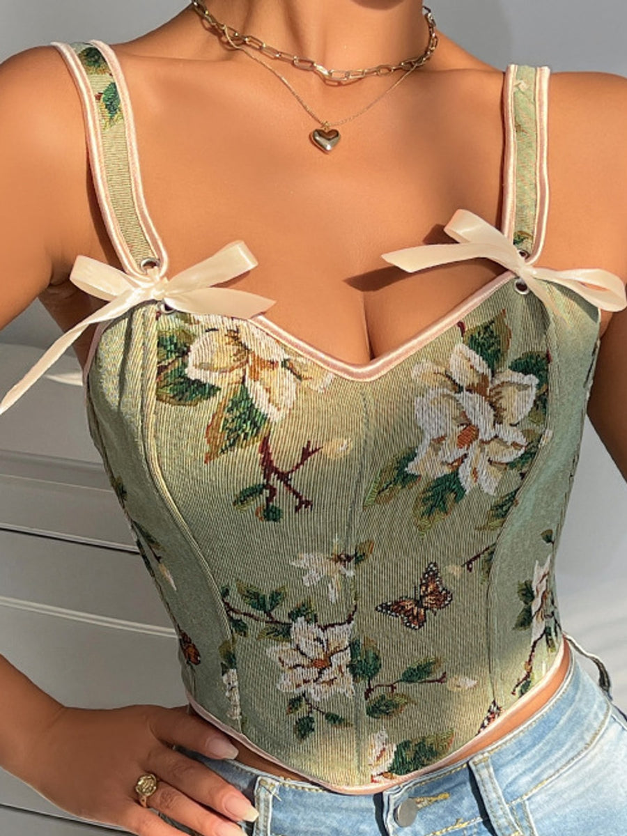 cream crop top featuring bow and floral
