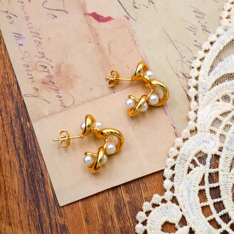 Synthetic Pearl,18K Gold-Plated,Stainless Steel Care instructions: Avoid wearing earrings in Gold with fitted silhouette