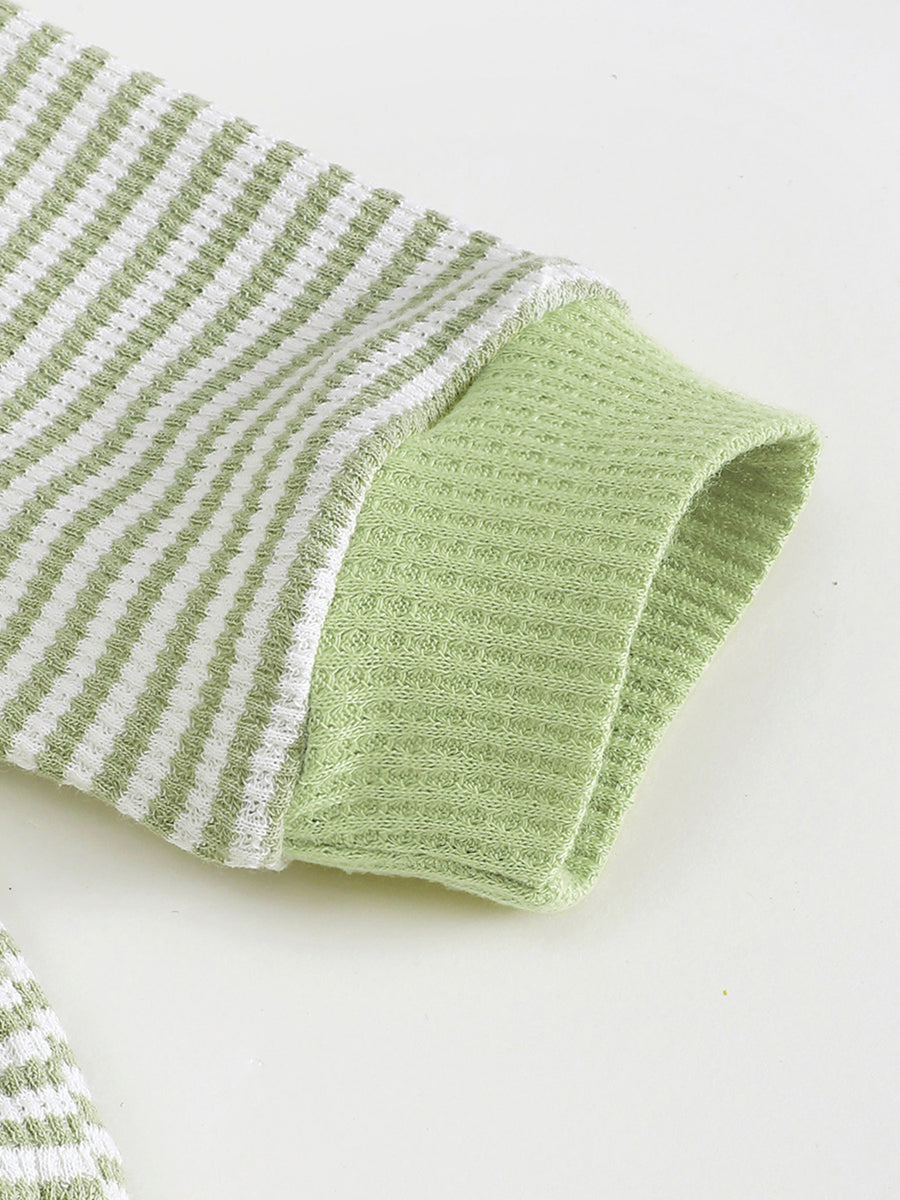 Children's green and white striped polo shirt sleeve with waffle knit cuff