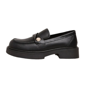 Black penny loafers with gold detail and platform sole