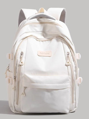 Large white nylon backpack with multiple zippered pockets and adjustable straps.