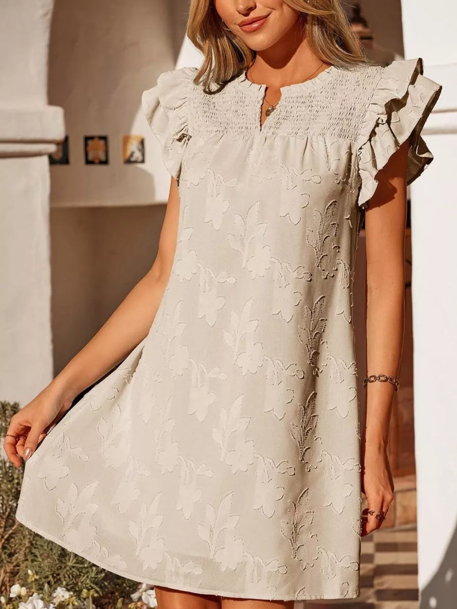 Apricot floral embossed mini dress with smocked bodice and ruffled sleeves