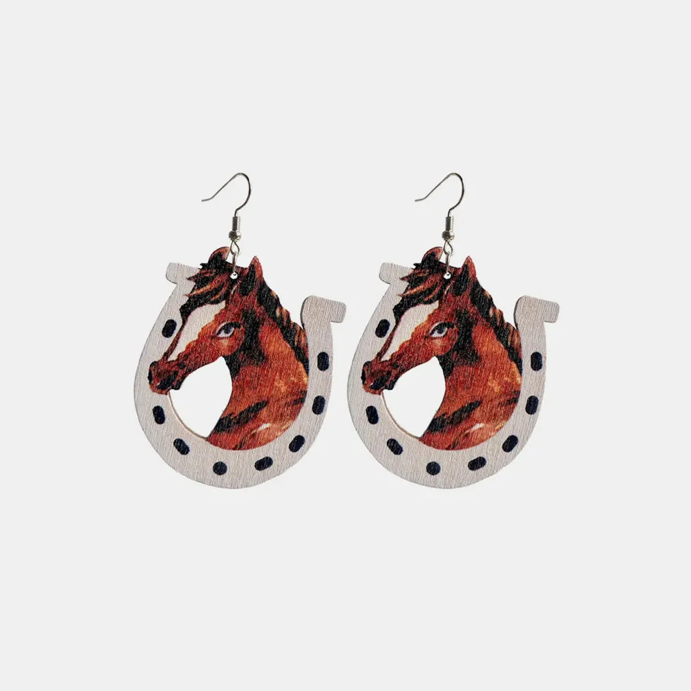 Horse and horseshoe drop earrings with black polka dots.