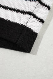 Black and white striped knit sweater with contrast trim detail