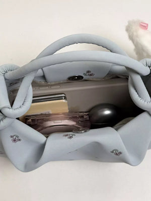 crossbody bag featuring ditsy floral in Purple with PU Leather Imported Size &amp texture