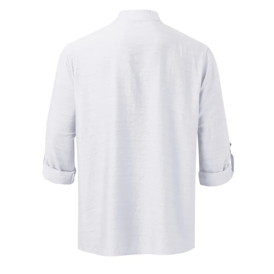 White linen-blend half-button shirt with rolled sleeves.