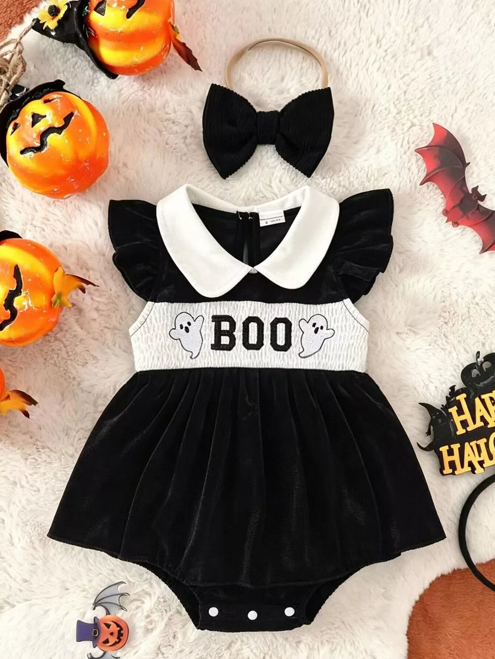 black bodysuit with graphic print and peter pan collar