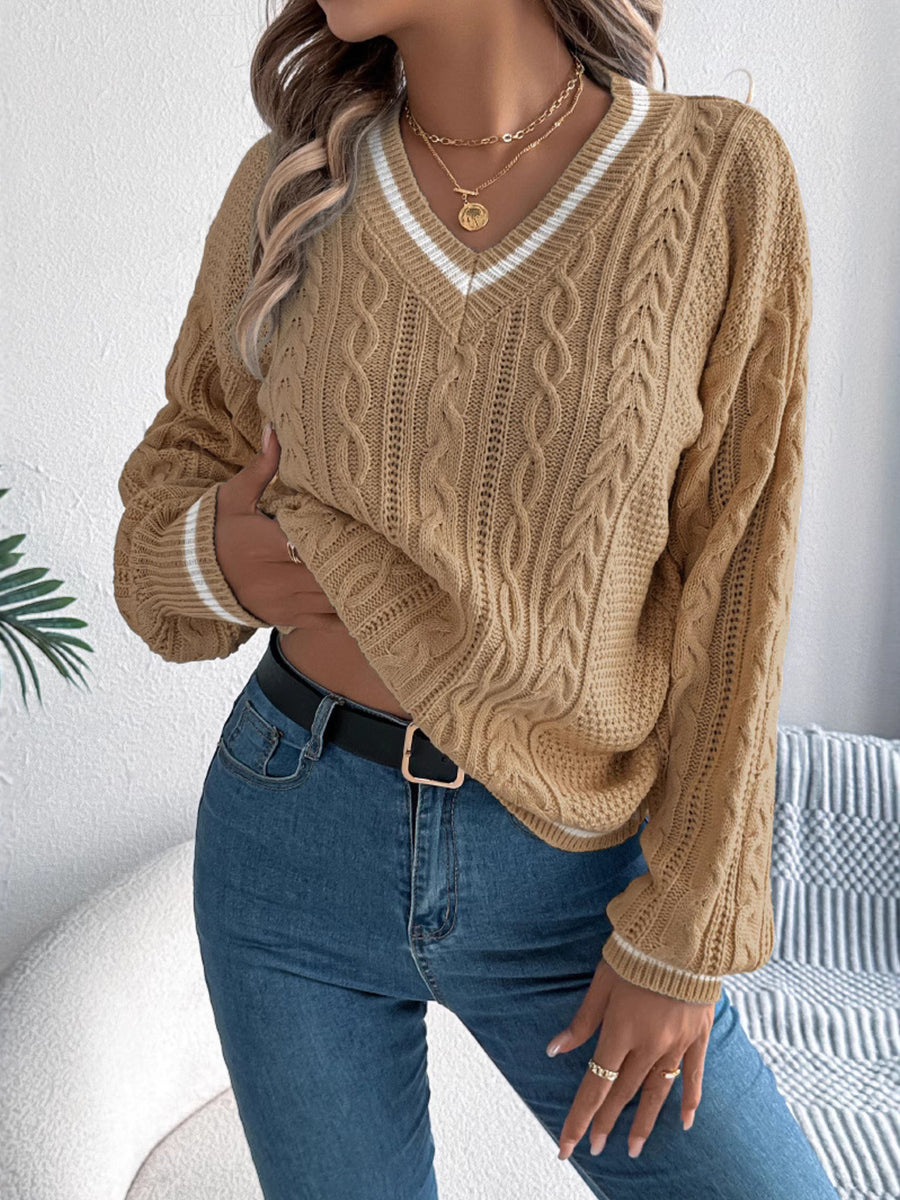 v-neck sweater featuring cable knit in Light Blue with 100% acrylic Care instructions: Machine wash cold texture