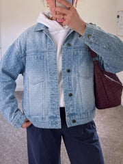 85% cotton, 15% polyester Care instructions: Machine wash cold denim jacket in Light Blue with relaxed silhouette