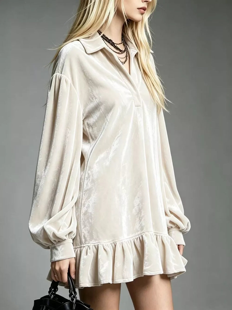 100% polyester Care instructions: Machine wash cold mini dress in Black with relaxed silhouette