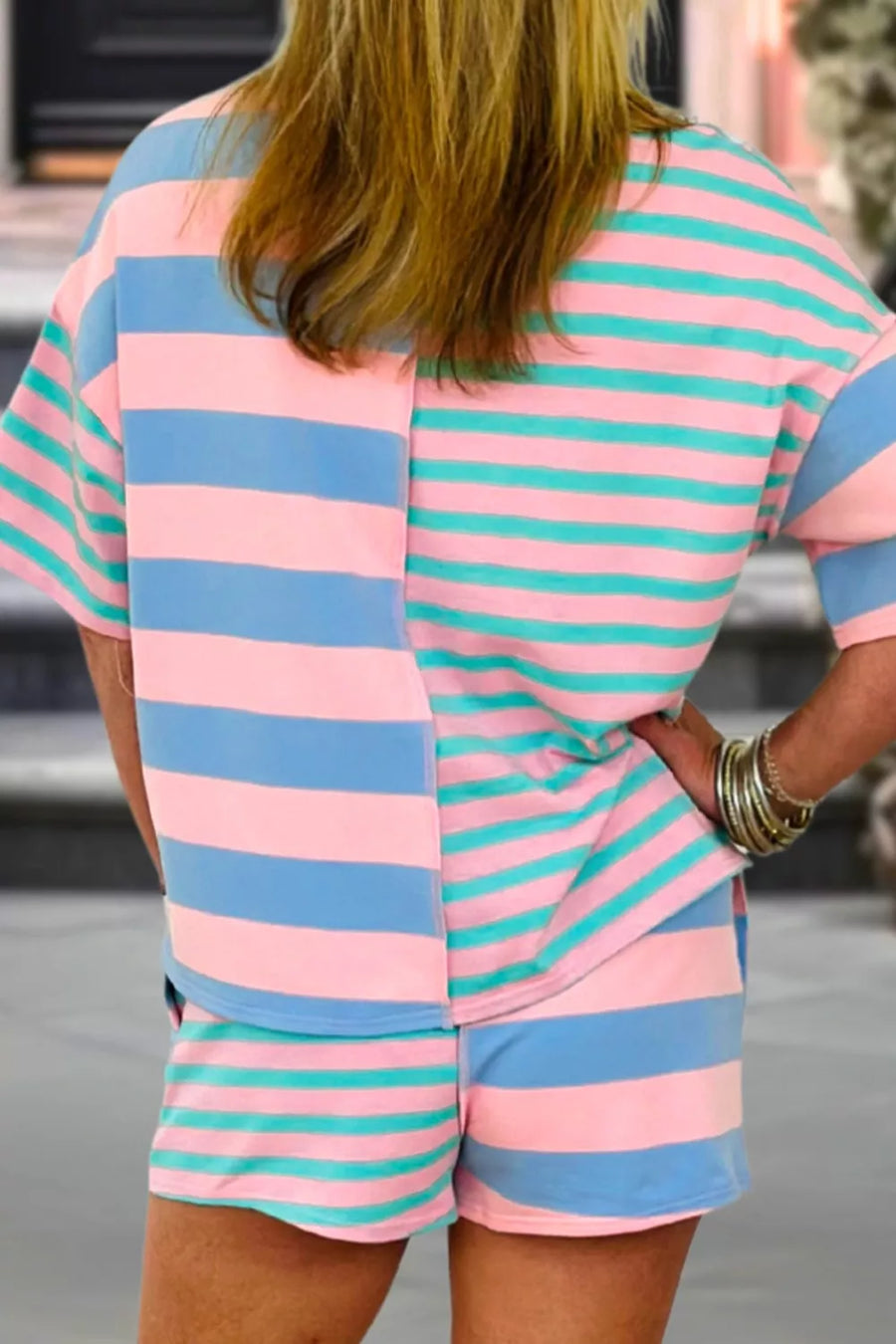 Pink, blue, and teal striped t-shirt and shorts set, short sleeves, relaxed fit.