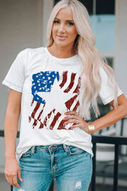 White t-shirt with distressed American flag graphic and round neck.