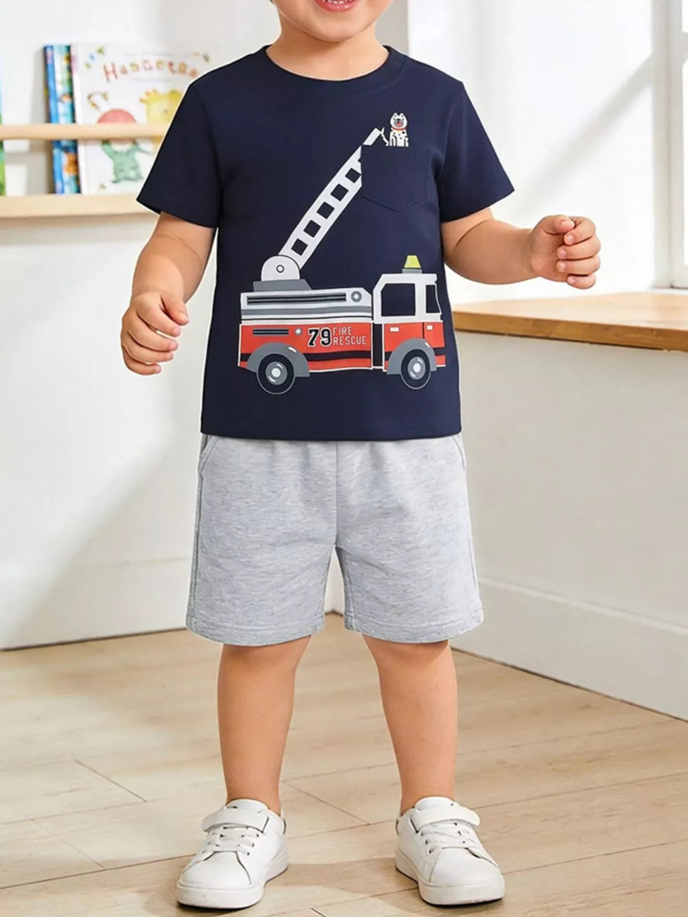Navy cotton toddler boys' t-shirt with fire truck graphic and grey shorts