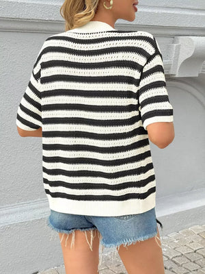 Black and white striped knit cardigan with short sleeves and a cropped fit.