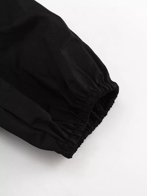 Black long sleeve with gathered elastic cuff