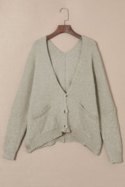 Khaki plush pocket cardigan with deep V-neck and button front.
