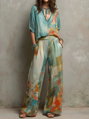 teal blouse and wide-leg pants set with floral and v-neck