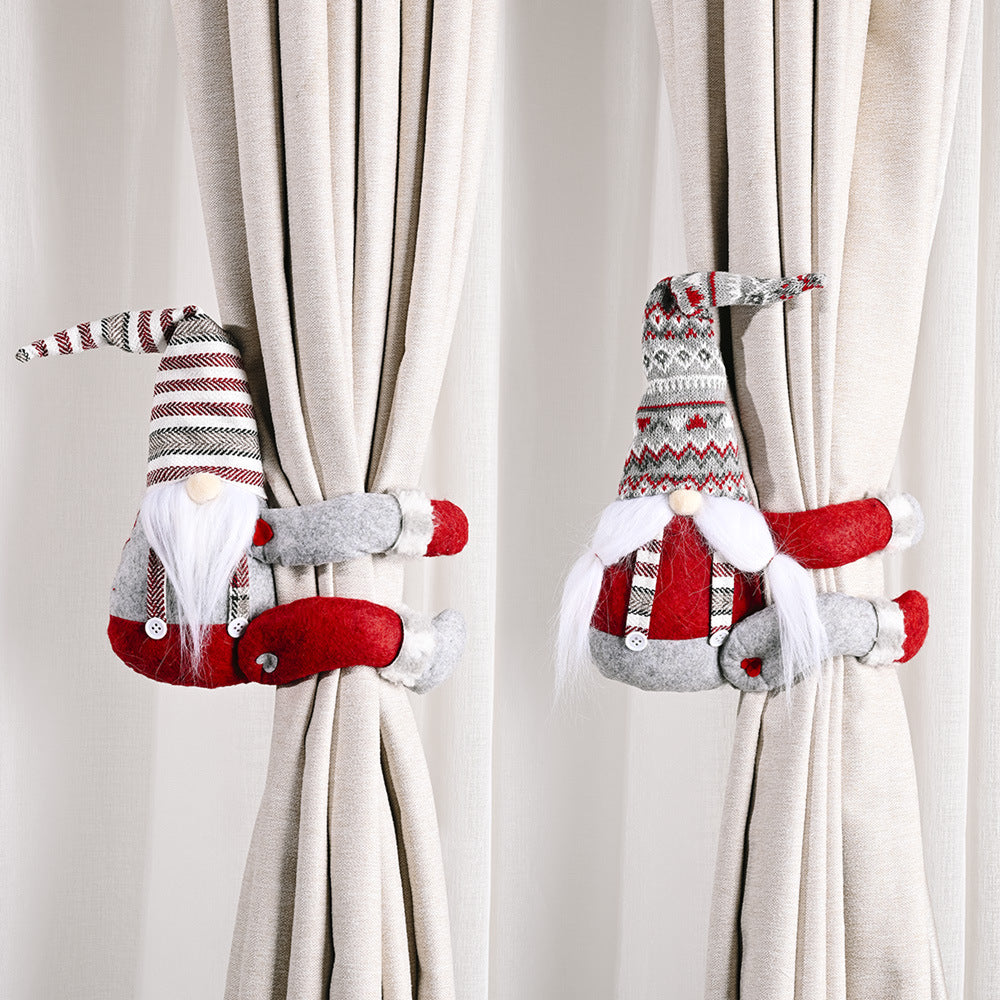 Charming gnome curtain tie-backs in red and grey with festive patterns.