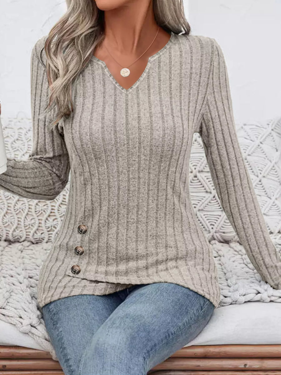 Gray ribbed knit top with notched neckline and button detail