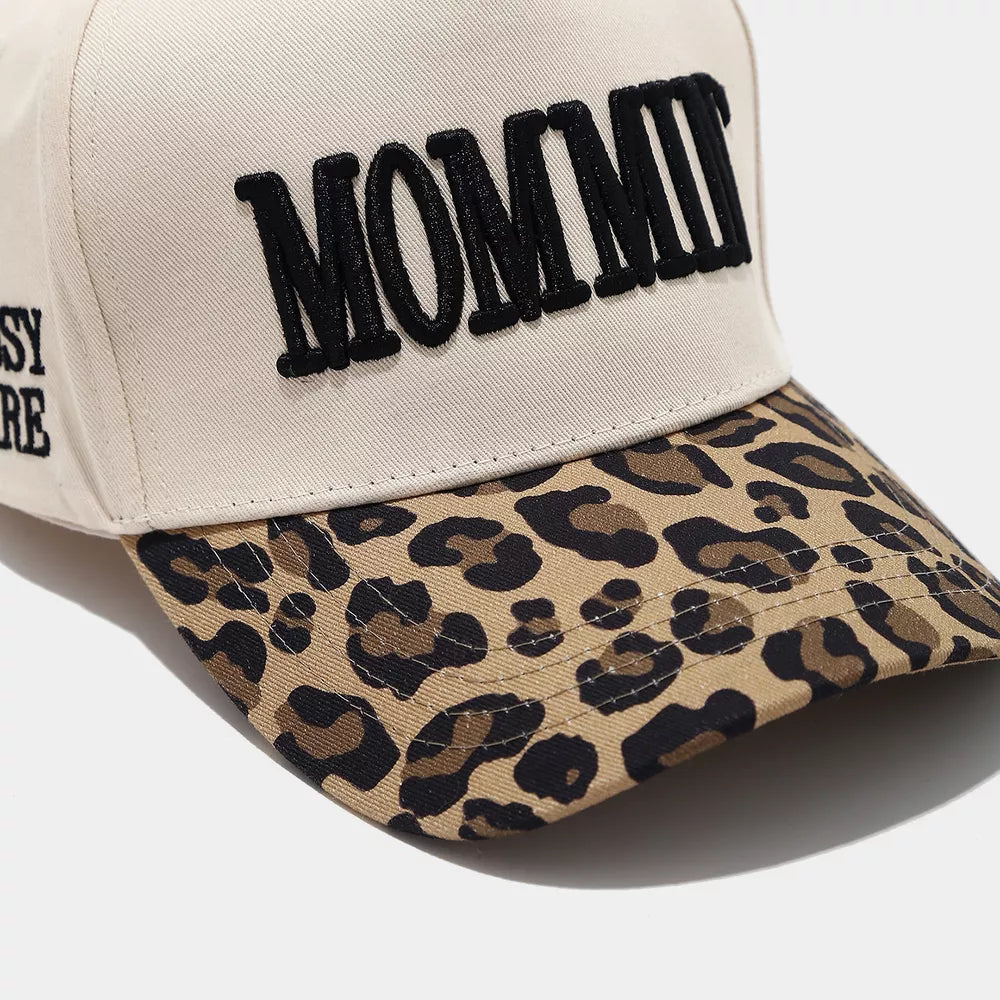 cap in cream with leopard-print and embroidered slogan