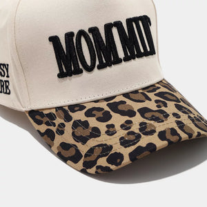 cap in cream with leopard-print and embroidered slogan