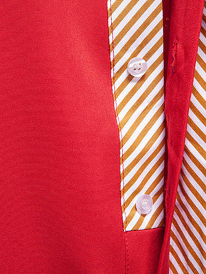 Red cotton button-up shirt with contrasting striped placket and white buttons.