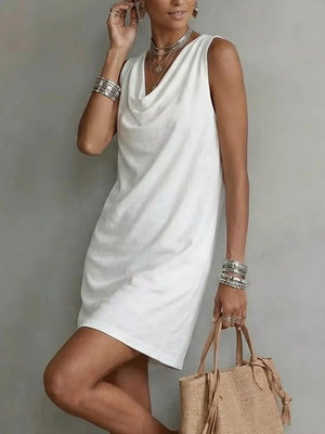 White sleeveless cowl neck mini dress with a relaxed fit.