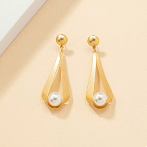 Synthetic Pearl,18K Gold-Plated,Alloy Care instructions: Avoid wearing during ex earrings in Gold with geometric silhouette
