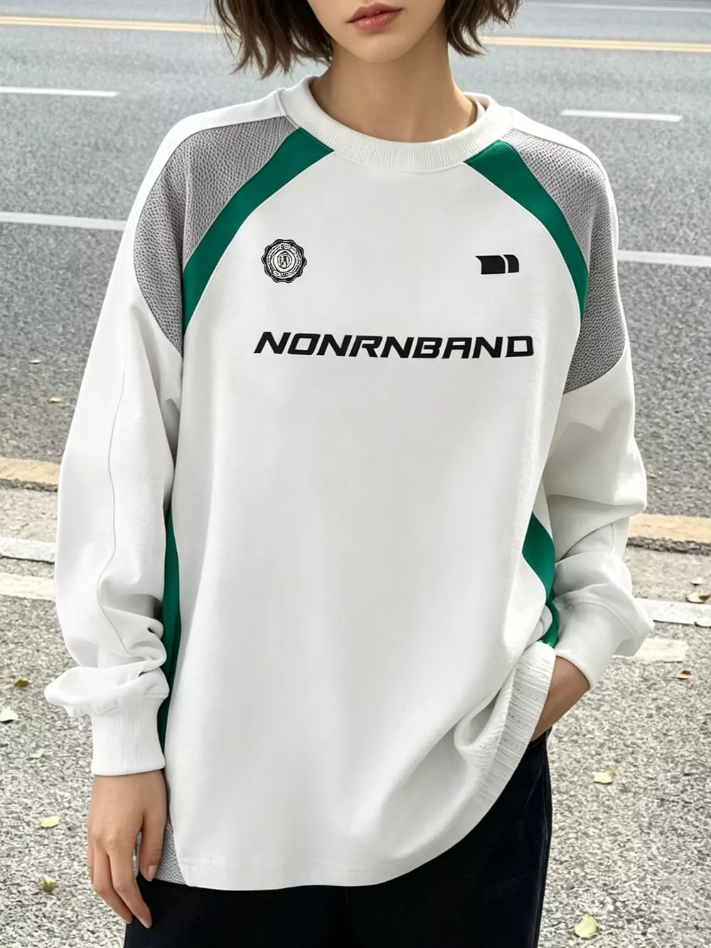 emerald green sweatshirt featuring raglan sleeve and color-block
