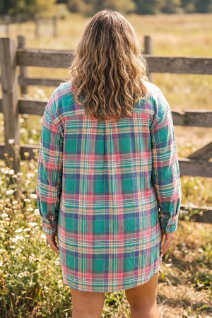 pink shirt dress featuring buttoned and plaid