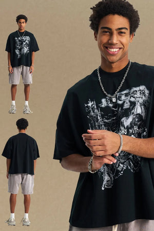 Black oversized graphic tee with gothic print and boxy silhouette.