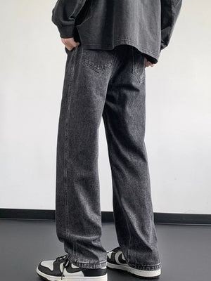Oversized drawstring loose fit jeans in dark gray denim with a relaxed cut.