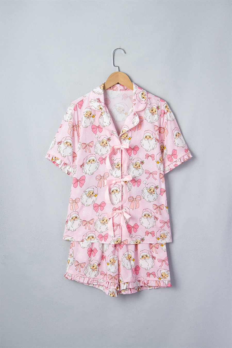 pajama set in Blush Pink with Santa print and ruffled