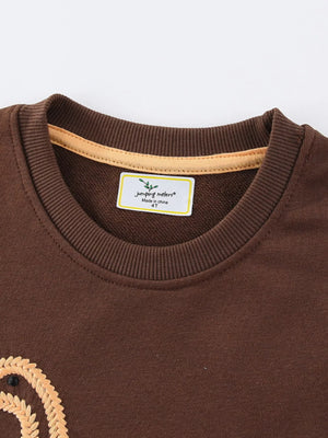 Dark brown cotton blend sweatshirt with dinosaur embroidery detail and crew neck.