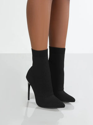 Black knit sock booties with pointed toe and stiletto heel