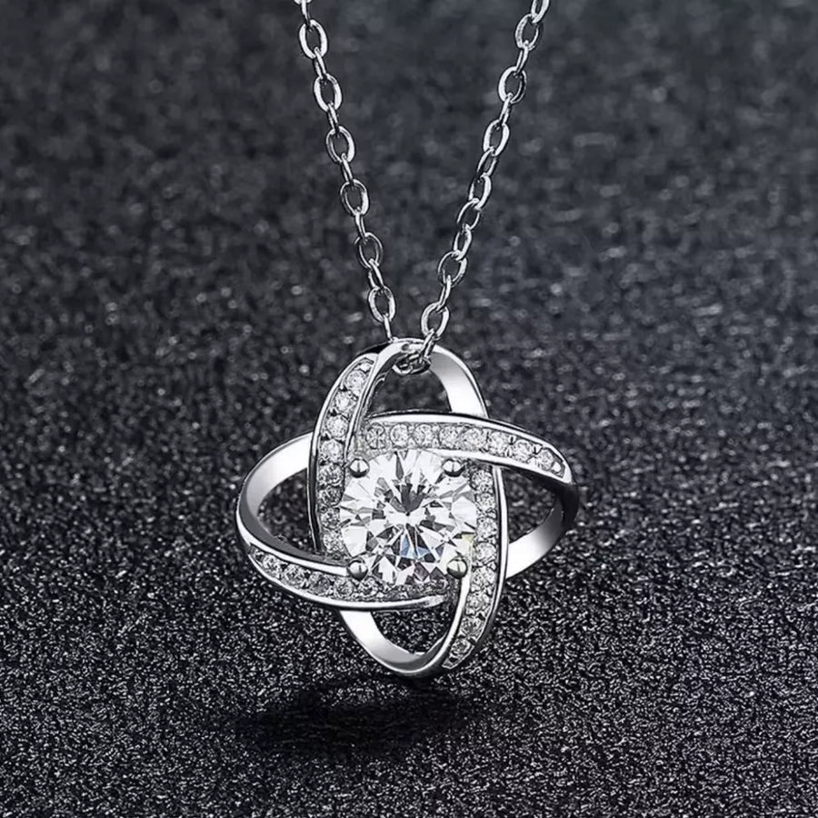 925 sterling silver,Moissanite Carat weight: 1ct Care instructions: Avoid wearin necklace in Silver with fitted silhouette