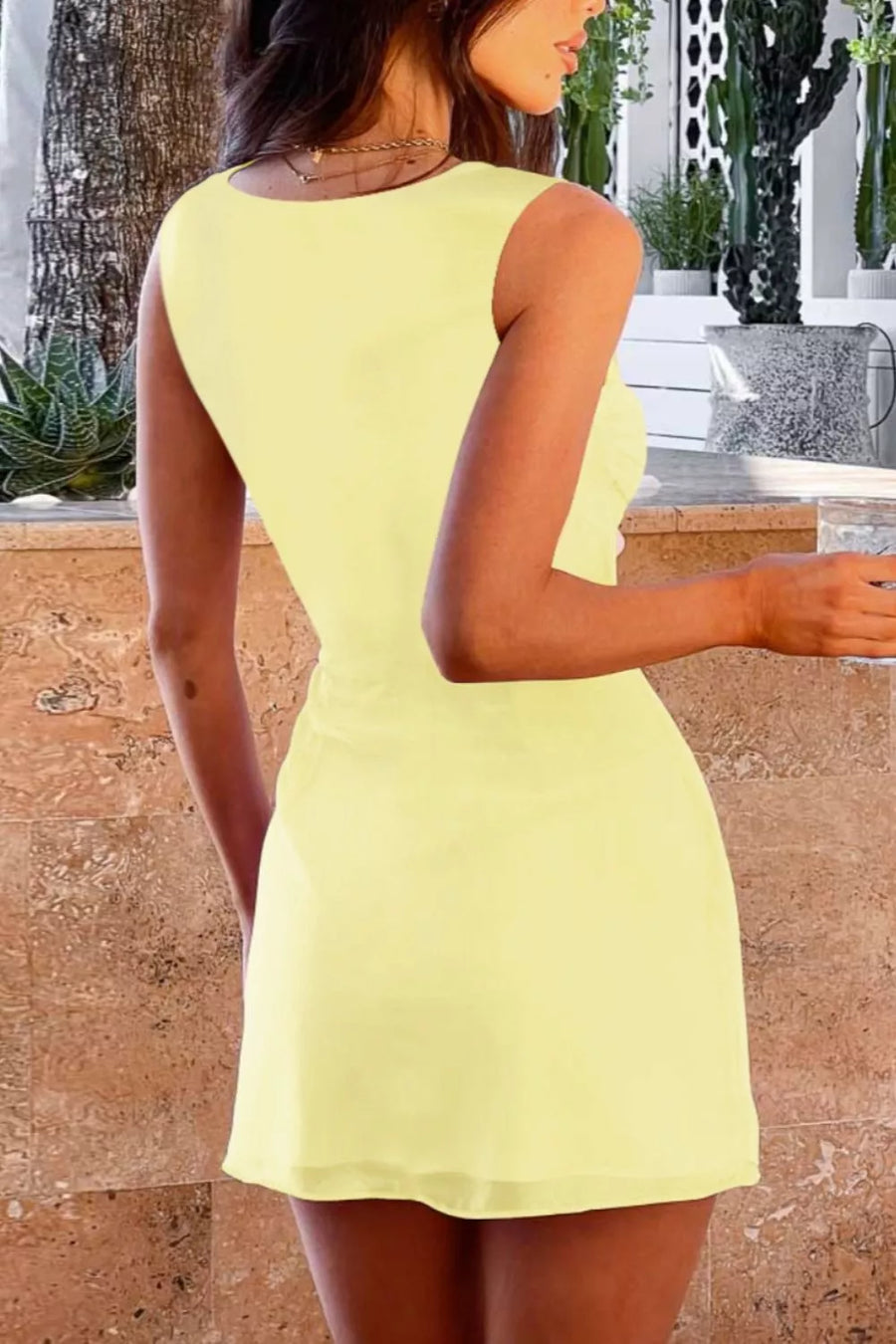 Yellow mini dress with square neckline and ruching detail, sleeveless, bodycon fit