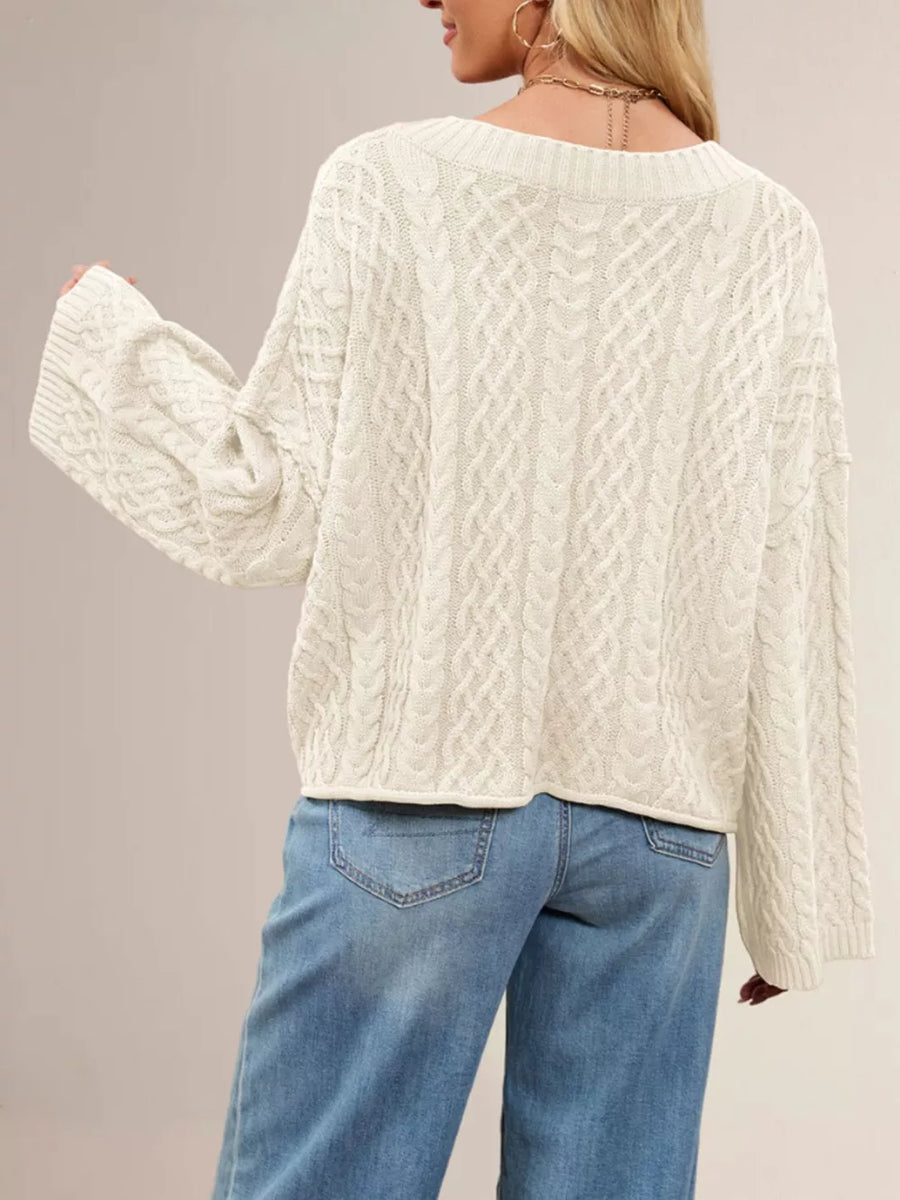 cardigan featuring cable knit in Black with 100% Acrylic Care instructions: Machine wash cold texture