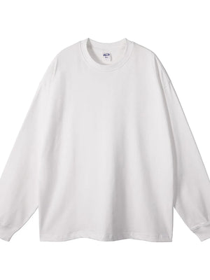 White oversized drop-shoulder crewneck pullover sweatshirt, 100% cotton, basic style.