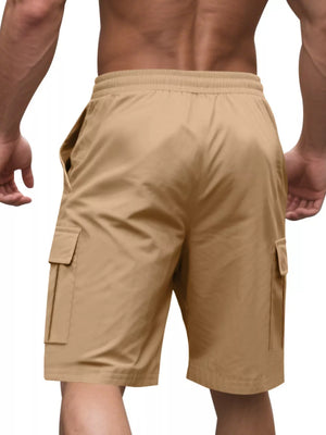 Tan cargo shorts with elastic waistband and side cargo pockets.