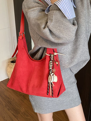 Solid Color Medium Suede Shoulder Bag in red with shoulder strap