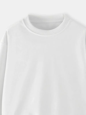 White crew-neck sweatshirt for kids with ribbed collar and cuffs.