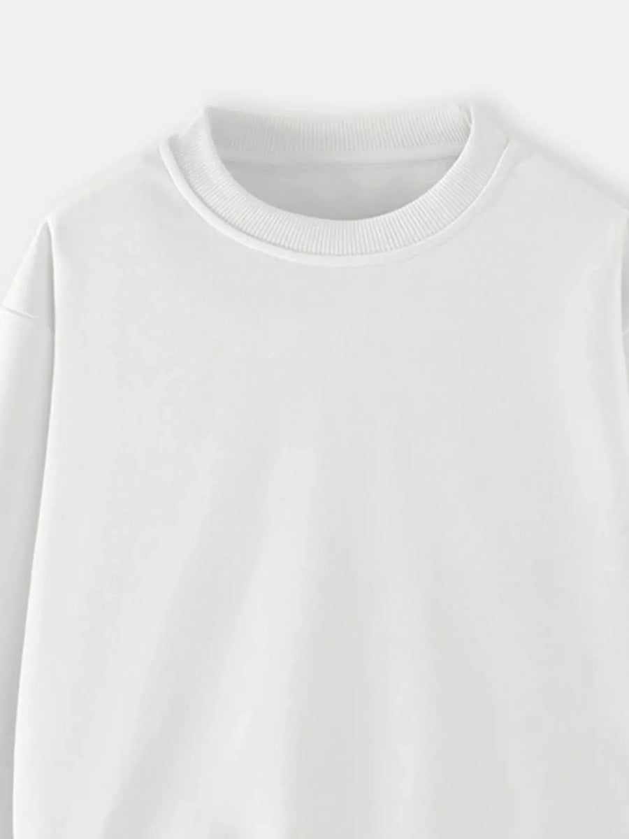 White crew-neck sweatshirt for kids with ribbed collar and cuffs.