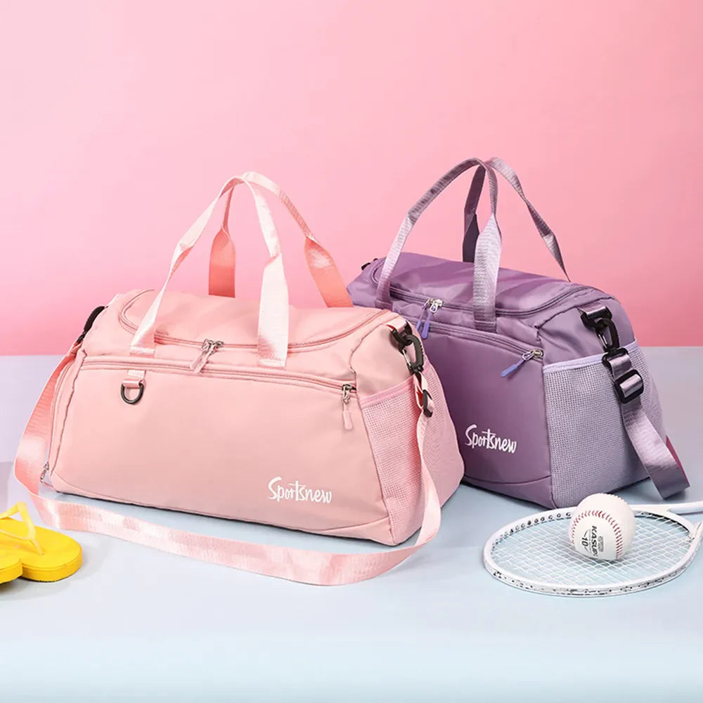 Sportsnew nylon duffle bag in Mauve and Watermelon pink with mesh pockets and adjustable straps.