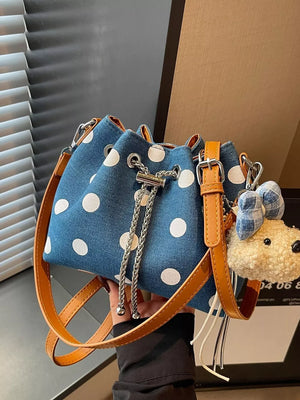 crossbody bag in denim blue with adjustable strap and small