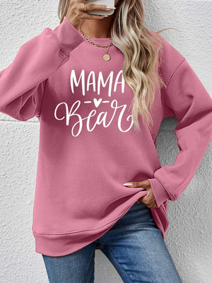 Mama Bear graphic sweatshirt in Blush Pink with crew neck and long sleeves.