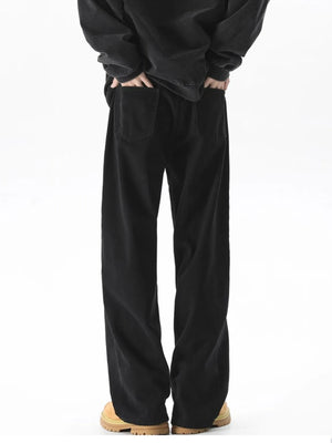 Black wide-leg comfort fit jeans with a cotton blend, shown from the back.