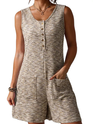 Textured button front romper in a speckled beige and brown knit with patch pockets.