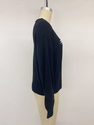 Swan Dropped Shoulder Sweater in white with dropped shoulder