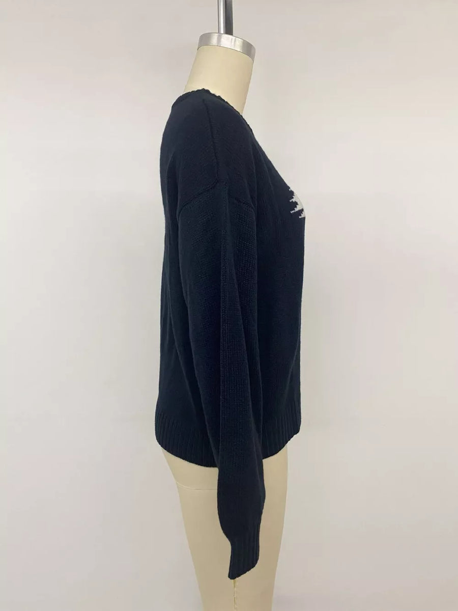 Swan Dropped Shoulder Sweater in white with dropped shoulder